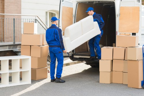 Professional movers loading household items for a Chiswick relocation