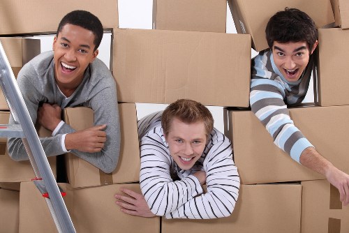 Moving day preparation for office removals in Chiswick with labelled boxes