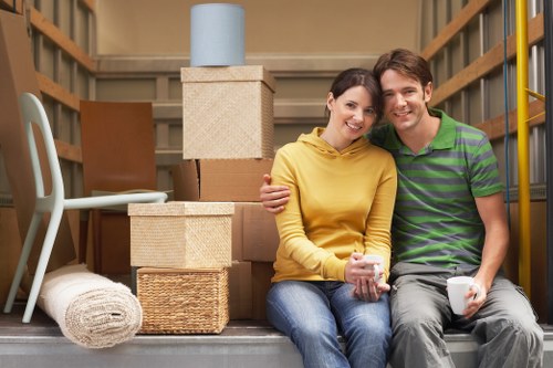 A local removals team handling furniture in Chiswick
