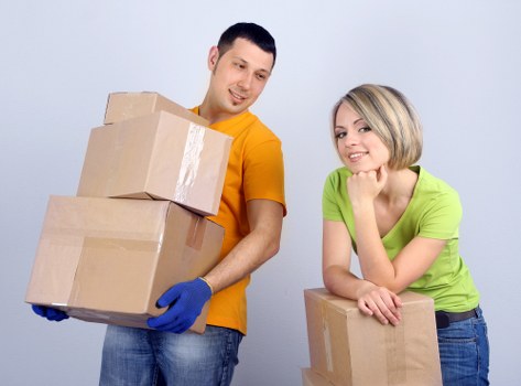 Loading furniture into a van for a Chiswick relocation