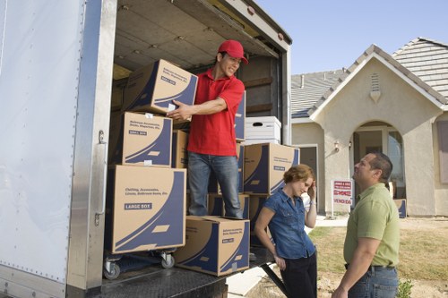 Assorted removal boxes and packing supplies for local home moving