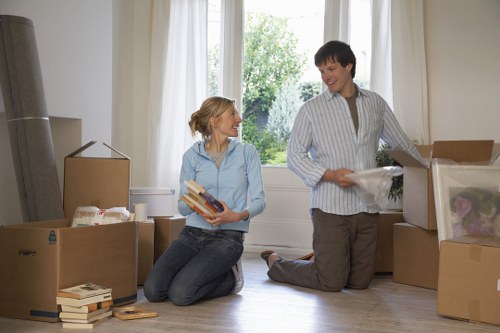 Careful packing of household items for a move in Chiswick